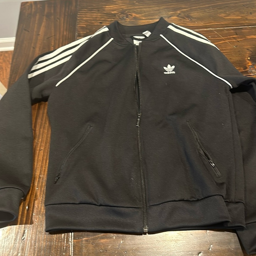 Women’s Adidas black zip up jacket. Size medium